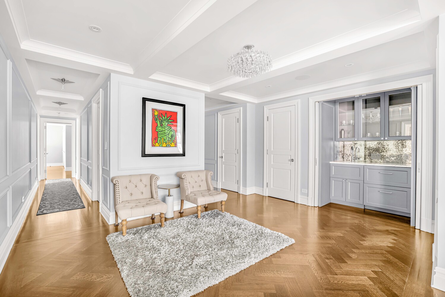 785 Park Avenue, Unit 13DE Manhattan, NY 10021 - Photo 4 of 15 a living room with furniture and a rug