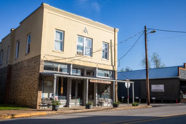 a view of a building with a tree