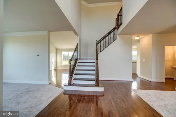 a view of entryway with wooden floor