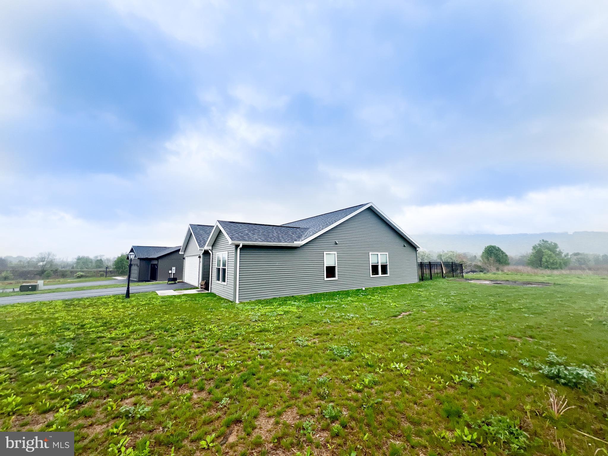 90 Tilbury Lane Reedsville, PA 17084 - Photo 5 of 28 a house view with a garden space