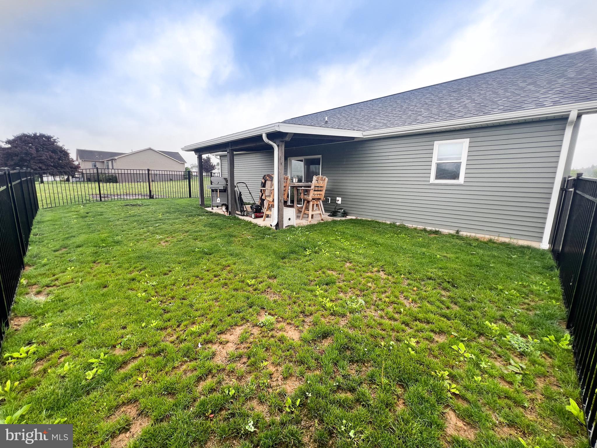 90 Tilbury Lane Reedsville, PA 17084 - Photo 7 of 28 a view of a house with a yard and sitting area