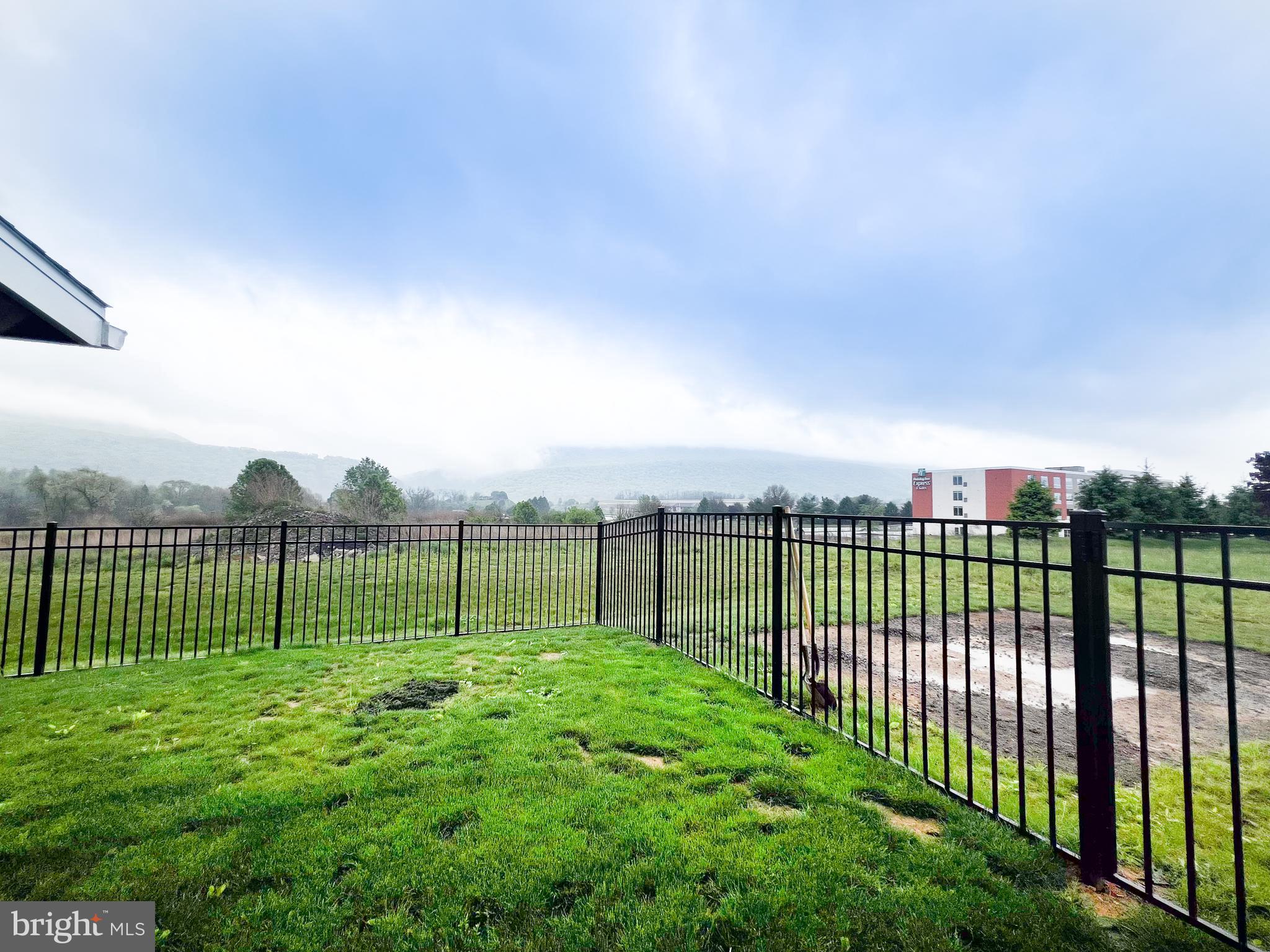 90 Tilbury Lane Reedsville, PA 17084 - Photo 8 of 28 a view of a backyard with a garden