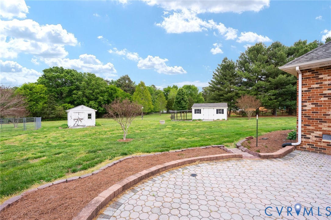 16379 Arch Hill Road Hanover, VA 23069 - Photo 25 of 26 a view of a house with a yard