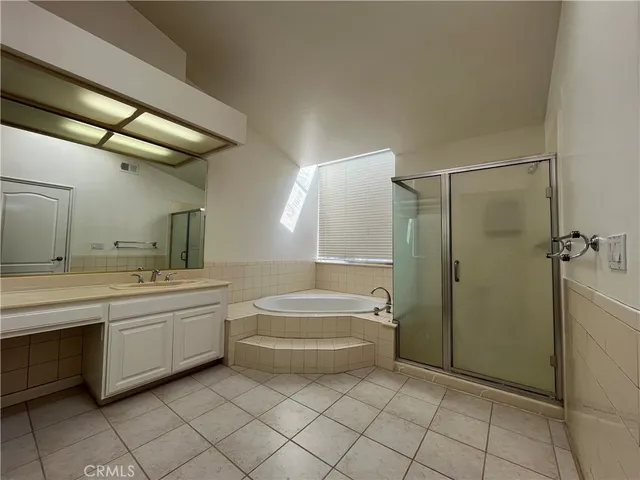 a bathroom with a sink a toilet and bathtub