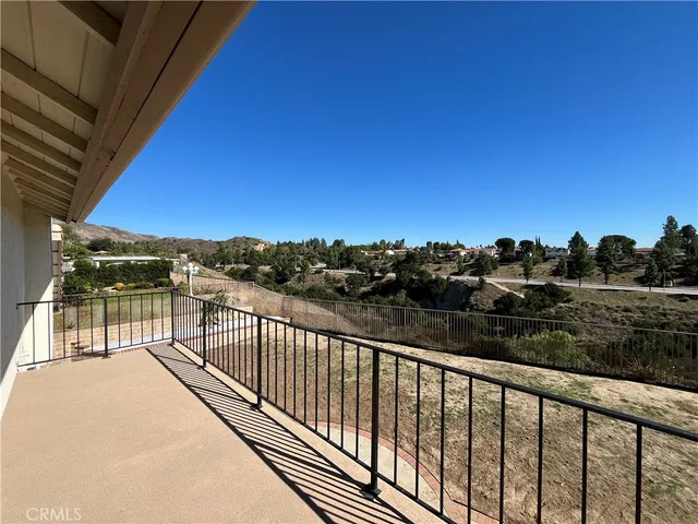 a kitchen with a stove a refrigerator and a sink