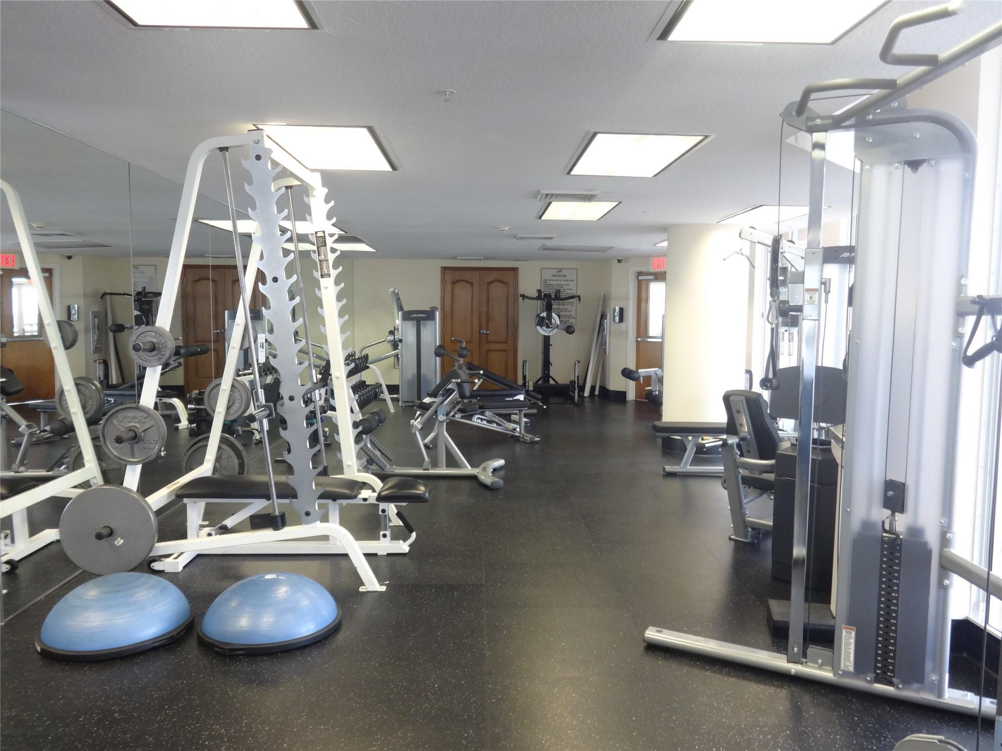 100 South Birch Road, Unit 1005D Fort Lauderdale, FL 33316 - Photo 34 of 36 Full set of gym equipment.