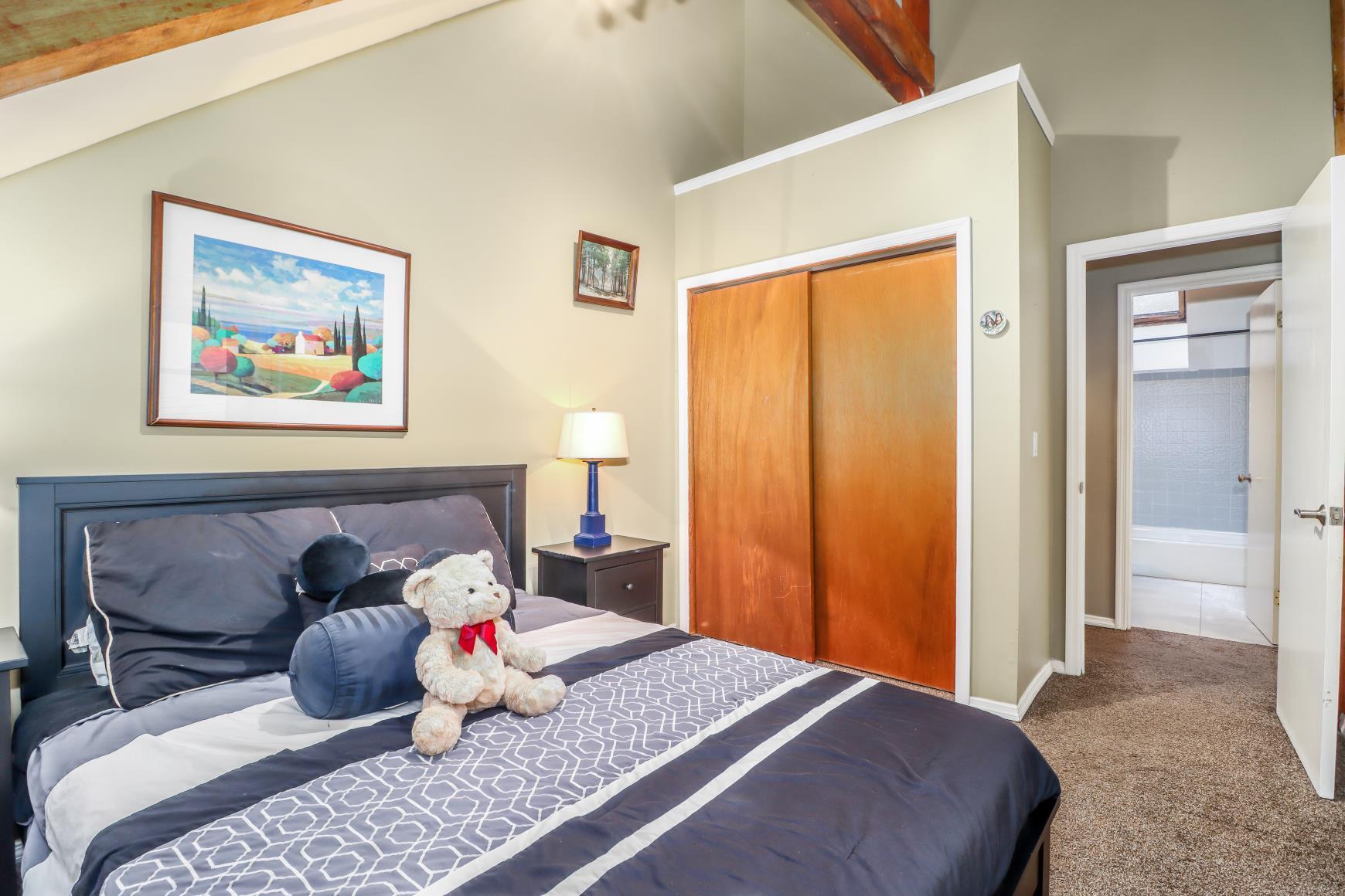 56 East Starrs Plain Road Danbury, CT 06810 - Photo 18 of 37 a bedroom with a bed and wooden floor