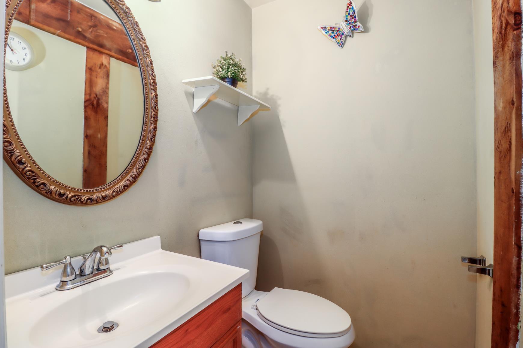 56 East Starrs Plain Road Danbury, CT 06810 - Photo 23 of 37 a white toilet sitting next to a bathroom sink