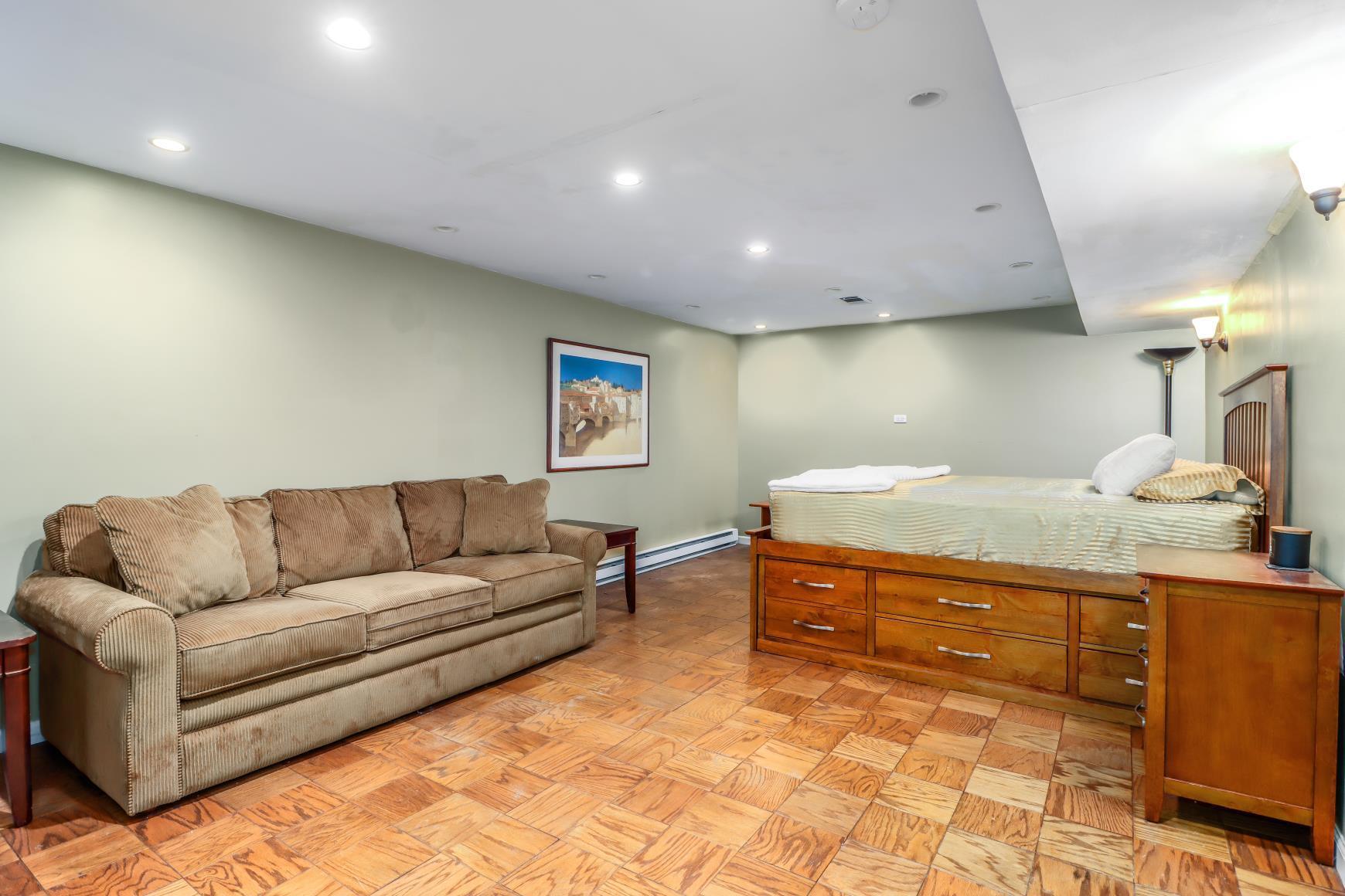 56 East Starrs Plain Road Danbury, CT 06810 - Photo 26 of 37 a living room with hard wood flooring and a couch