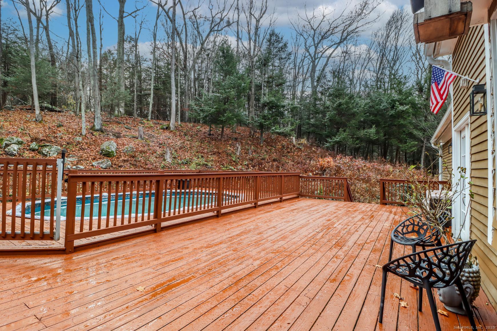 56 East Starrs Plain Road Danbury, CT 06810 - Photo 30 of 37 a balcony with wooden floor and outdoor space