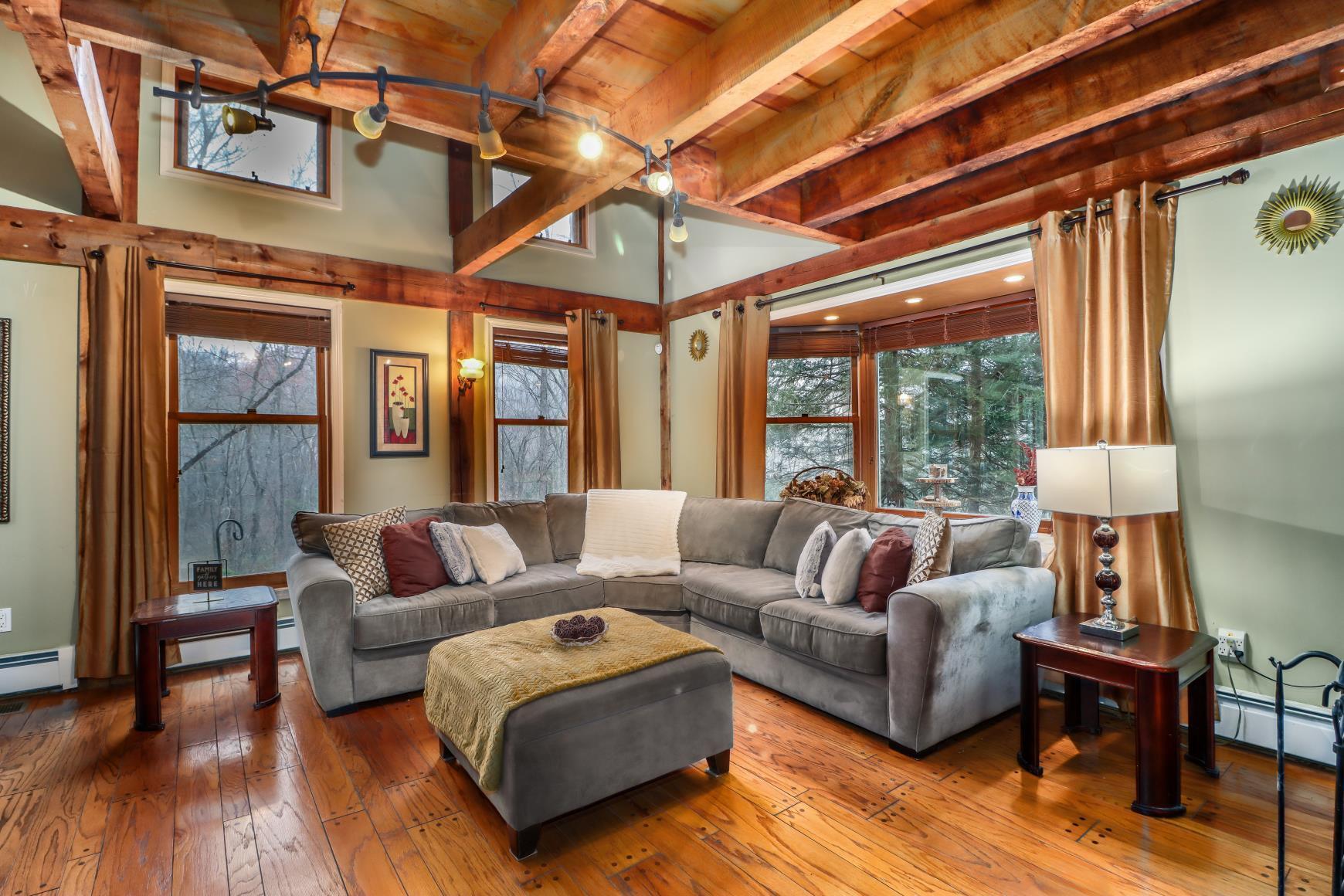 56 East Starrs Plain Road Danbury, CT 06810 - Photo 6 of 37 a living room with furniture and a large window