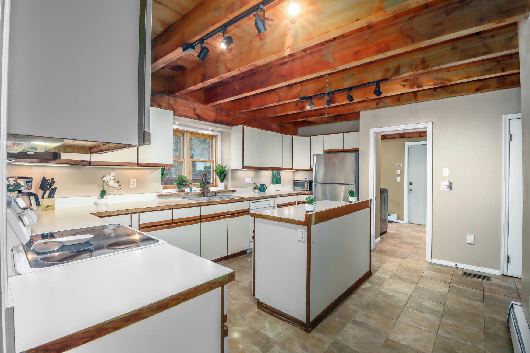 56 East Starrs Plain Road Danbury, CT 06810 - Photo 7 of 37 a kitchen with counter top space and appliances