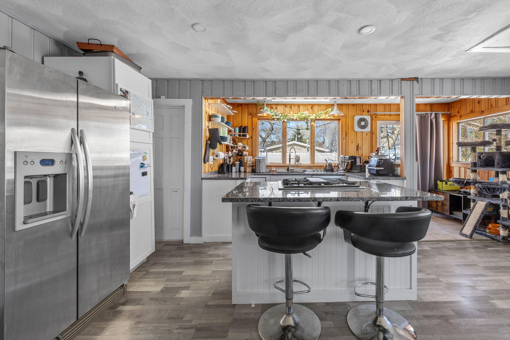 6 Pine Street Wareham, MA 02571 - Photo 12 of 32 a kitchen with a table and chairs