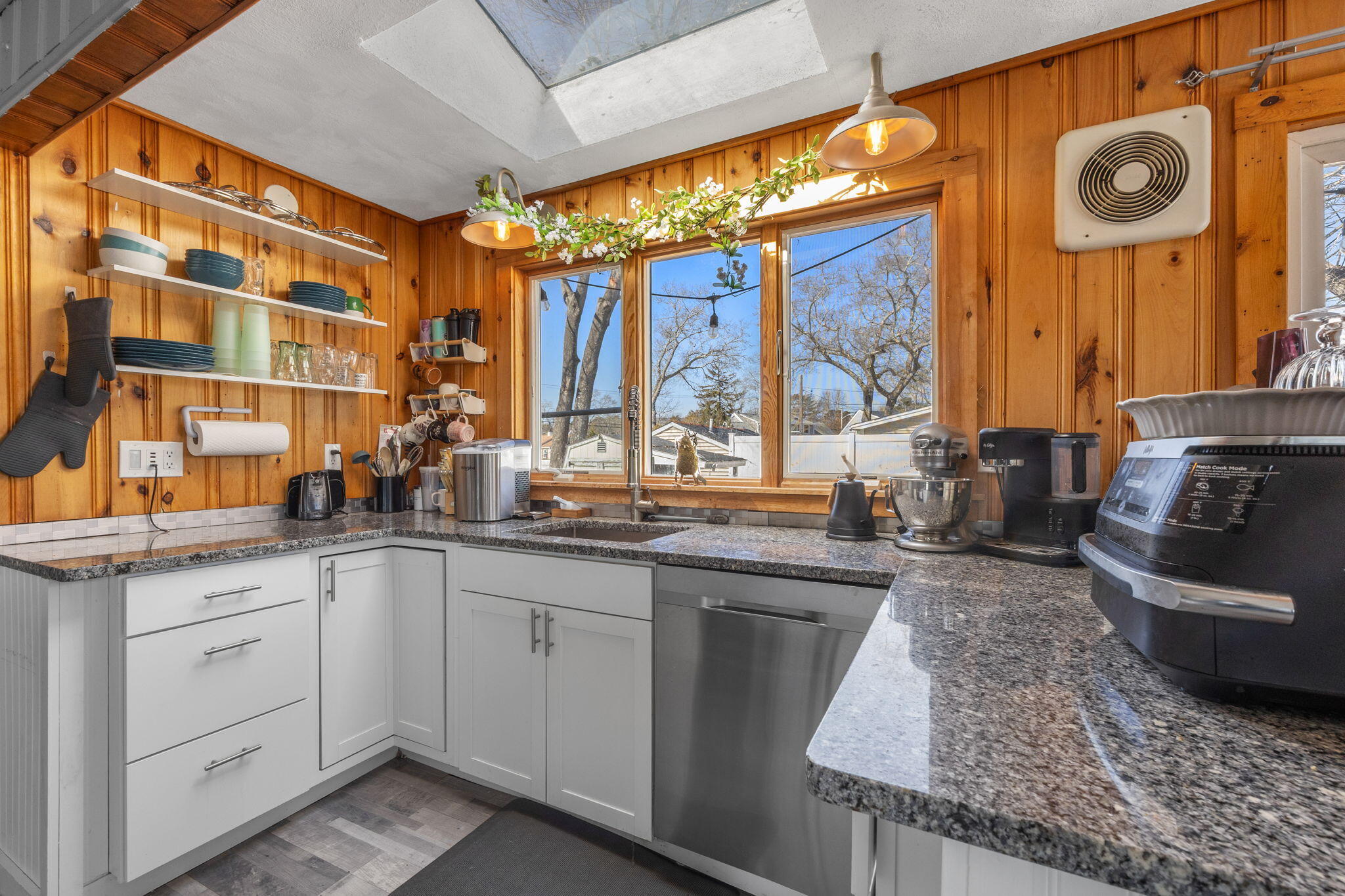 6 Pine Street Wareham, MA 02571 - Photo 13 of 32 a kitchen with stainless steel appliances granite countertop a sink and cabinets