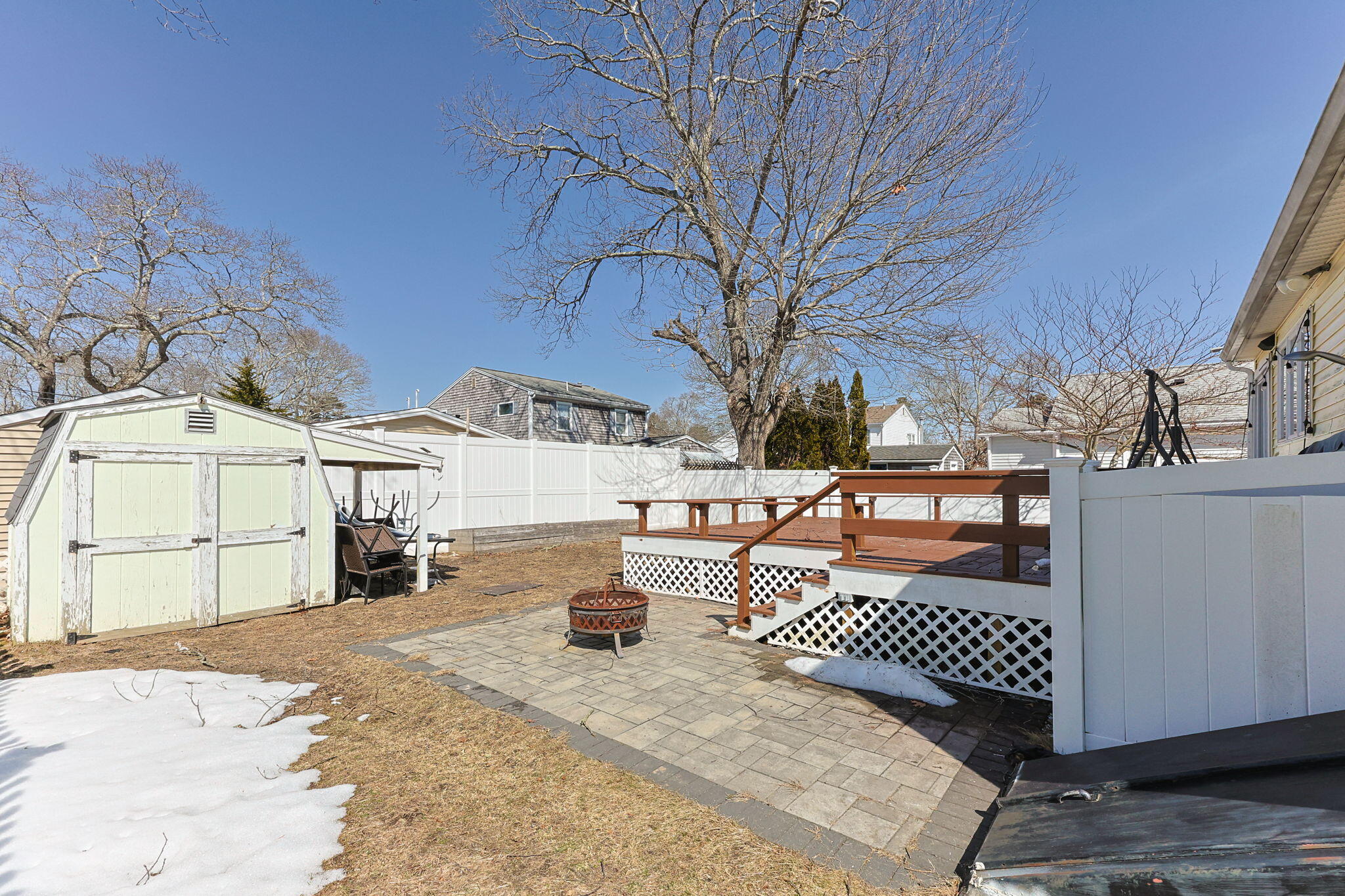 6 Pine Street Wareham, MA 02571 - Photo 20 of 32 a view of a terrace with trees