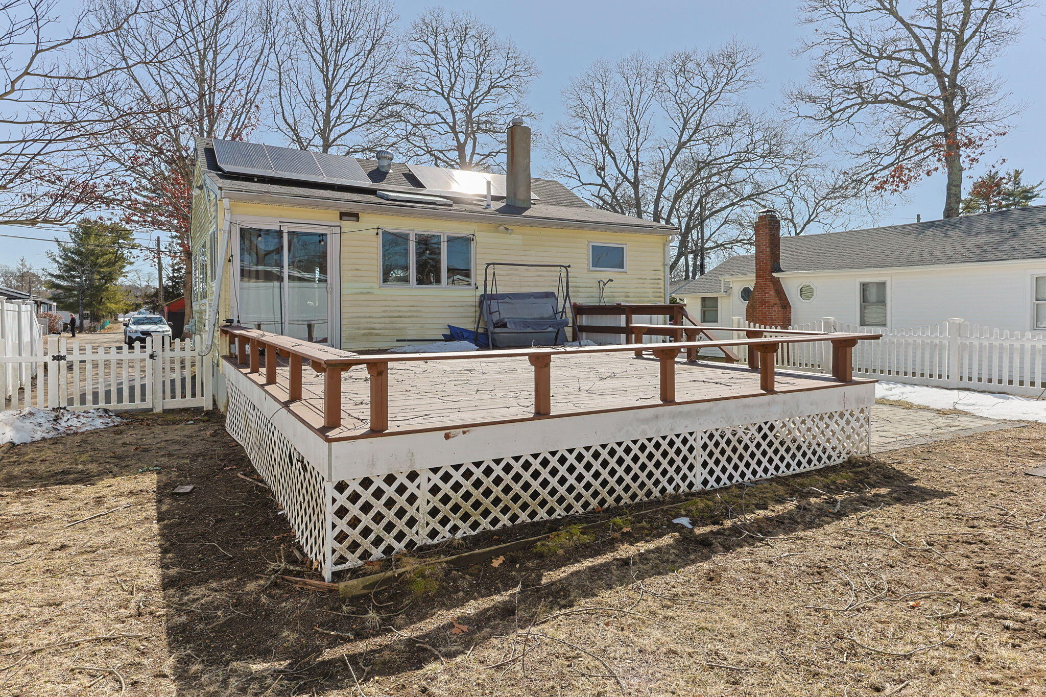 6 Pine Street Wareham, MA 02571 - Photo 22 of 32 a view of a house with a deck