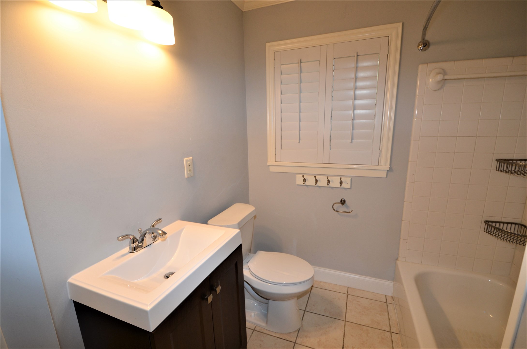 1902 Coulcrest Drive Houston, TX 77055 - Photo 15 of 27 a bathroom with a sink a toilet and shower