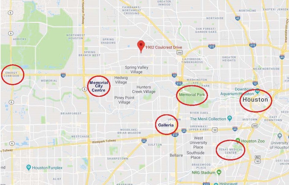 1902 Coulcrest Drive Houston, TX 77055 - Photo 22 of 27 a utility room with a wall and a clock on the wall