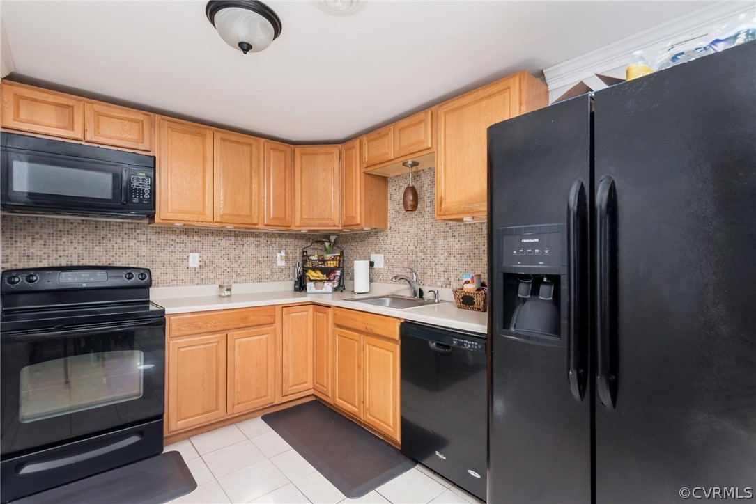 6424 Husting Road Chesterfield, VA 23832 - Photo 6 of 16 a kitchen with stainless steel appliances granite countertop a refrigerator sink and stove