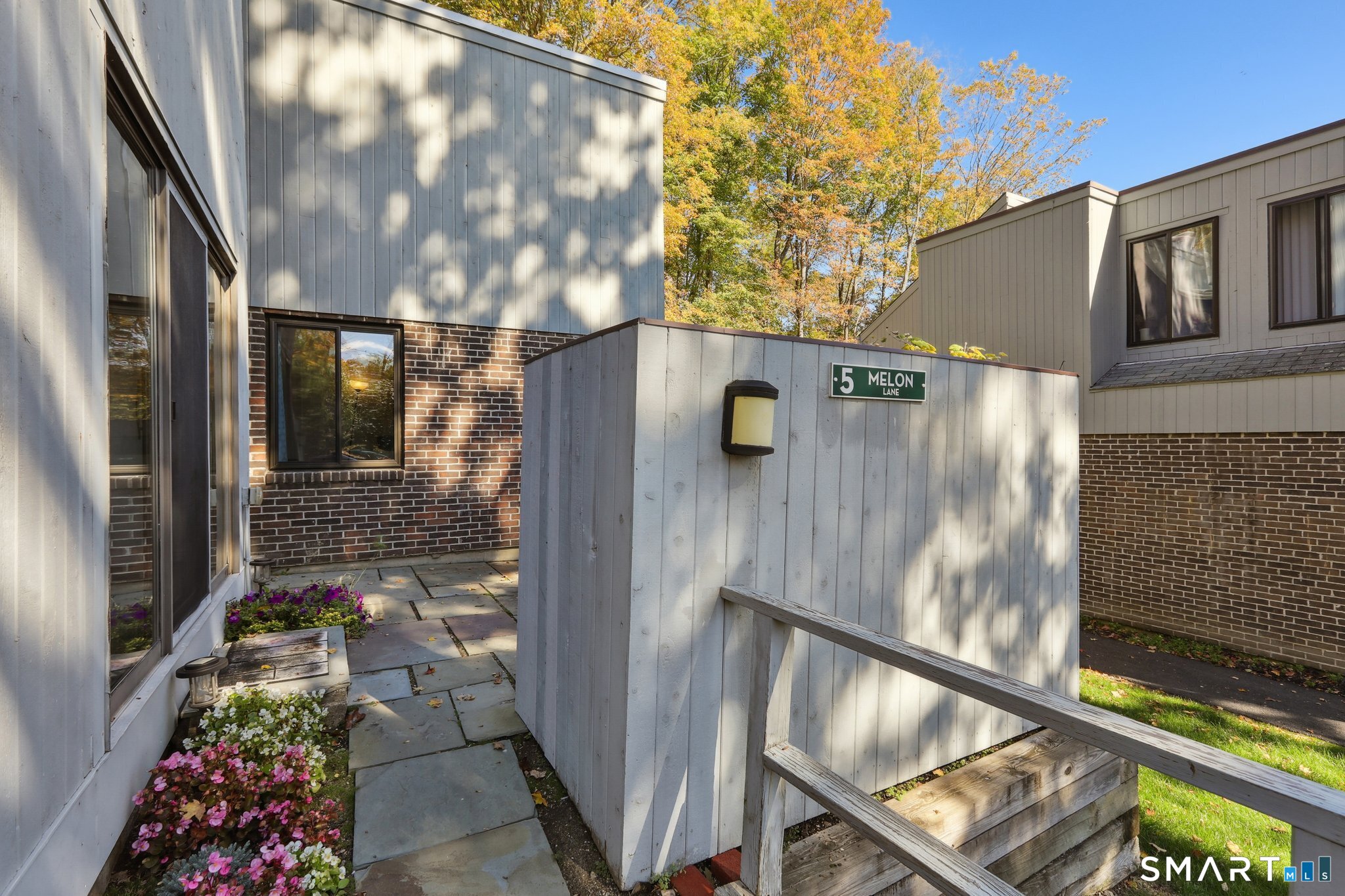 a backyard of a house with seating space