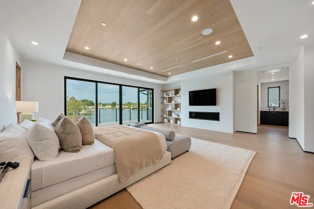 a view of kitchen with cabinets and wooden floor