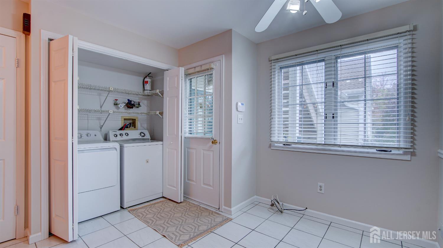 40 B Rutland Lane Monroe Township, NJ 08831 - Photo 23 of 31 a view of an empty room with window and cabinet