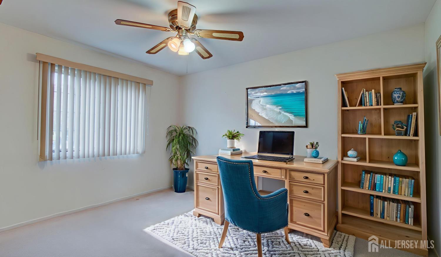 40 B Rutland Lane Monroe Township, NJ 08831 - Photo 27 of 31 a view of a workspace with furniture and a window