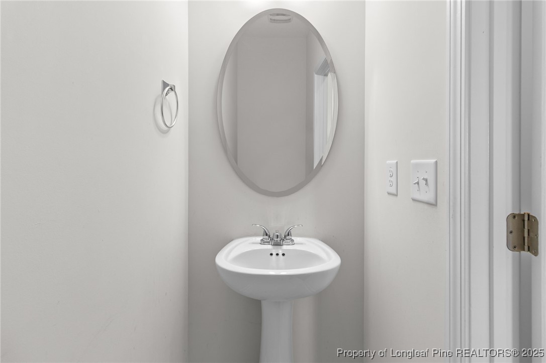 4095 Irwin Drive Aberdeen, NC 28315 - Photo 11 of 44 Half Bathroom Downstairs
