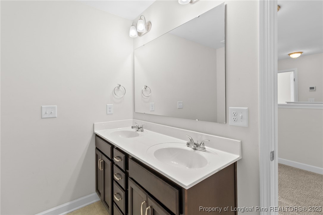 4095 Irwin Drive Aberdeen, NC 28315 - Photo 33 of 44 Hallway Bathroom