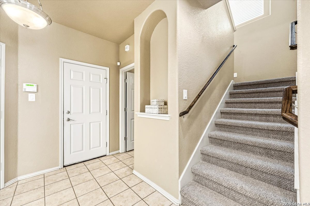 3831 Bacall Way Converse, TX 78109 - Photo 17 of 33 a view of entryway and hall with wooden floor