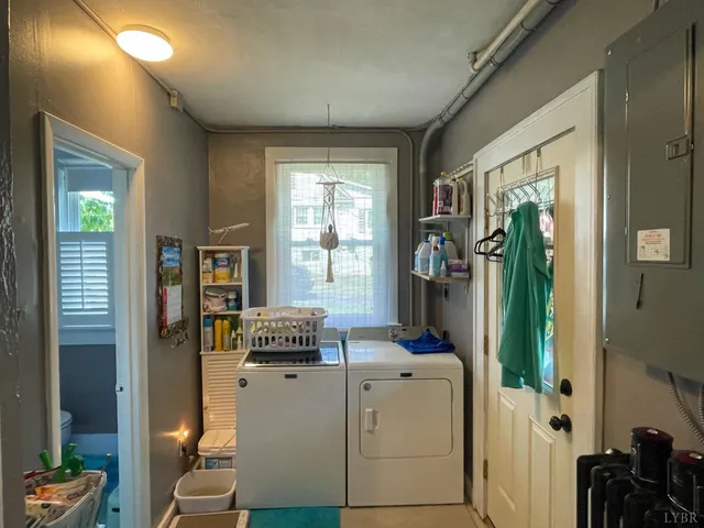 a workspace with furniture and window