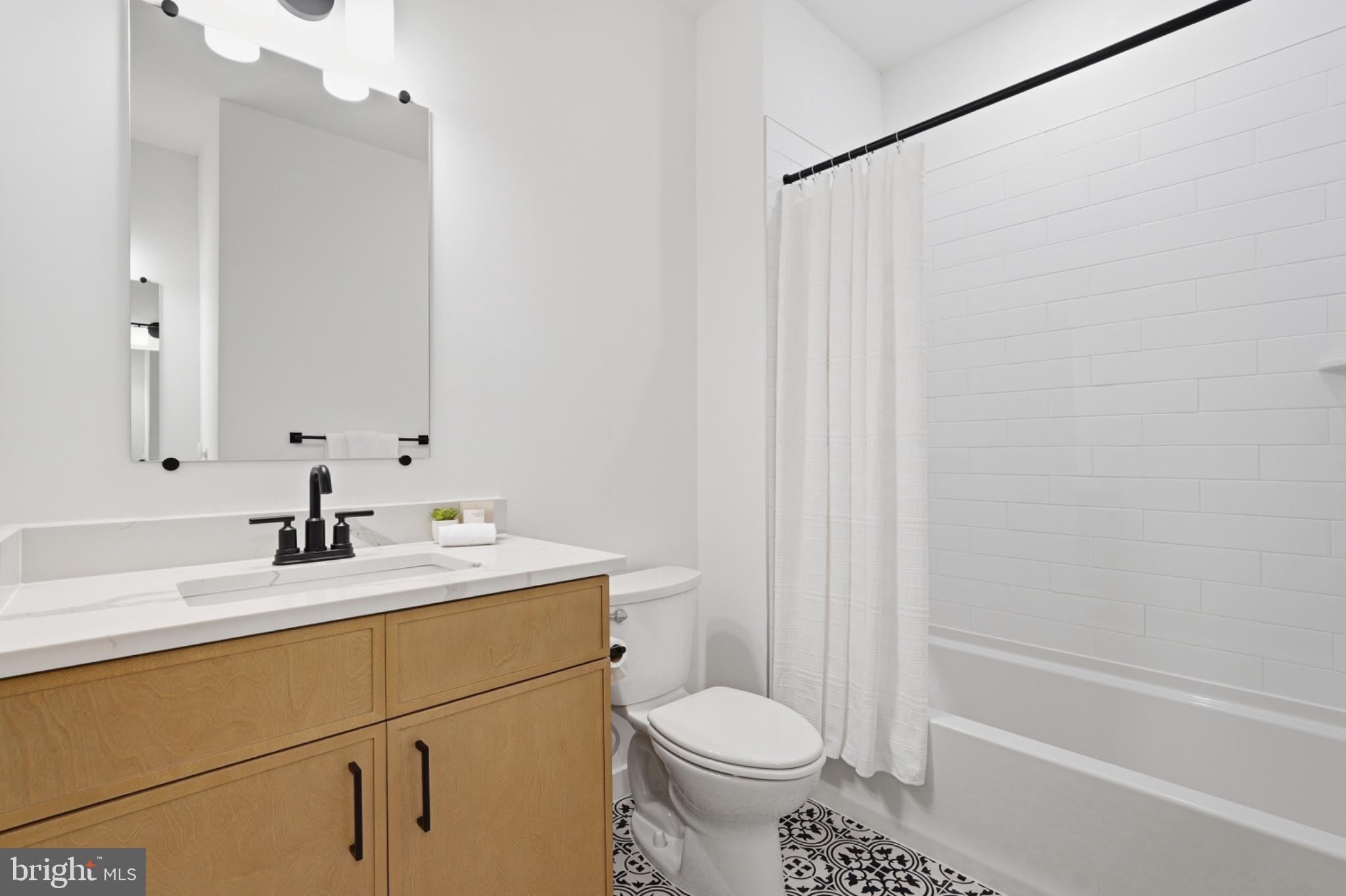 2802 Bidle Road Middletown, MD 21769 - Photo 41 of 63 Sleek modern bathroom with stylish accents.