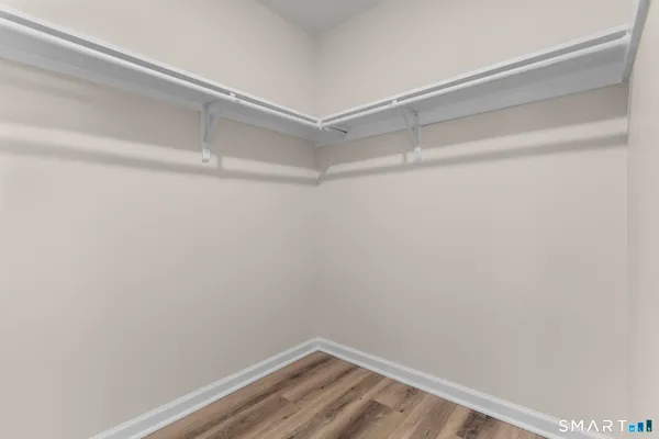 a view of an empty walk in closet
