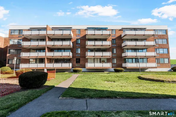 a tall building sitting on the side of a street