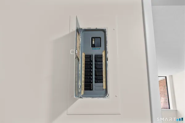 a front view of a building with parking space