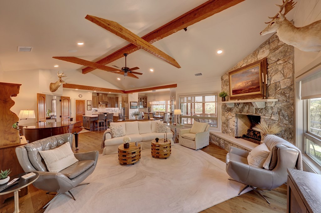 127 Keagan Drive Hunt, TX 78024 - Photo 6 of 12 a living room with furniture and a fireplace