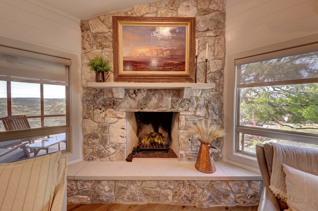 127 Keagan Drive Hunt, TX 78024 - Photo 8 of 12 a living room with furniture and a fireplace