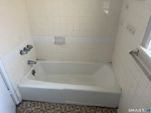a bathroom with a bathtub