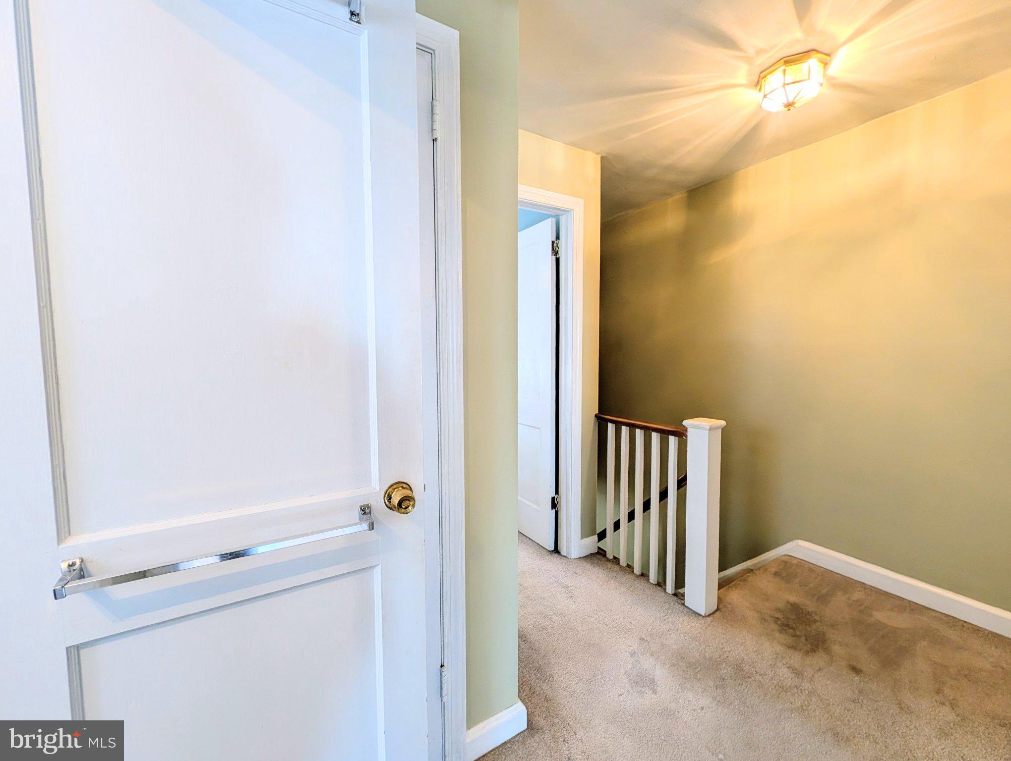 568 Michell Street Ridley Park, PA 19078 - Photo 18 of 41 Inviting hallway with soft lighting.