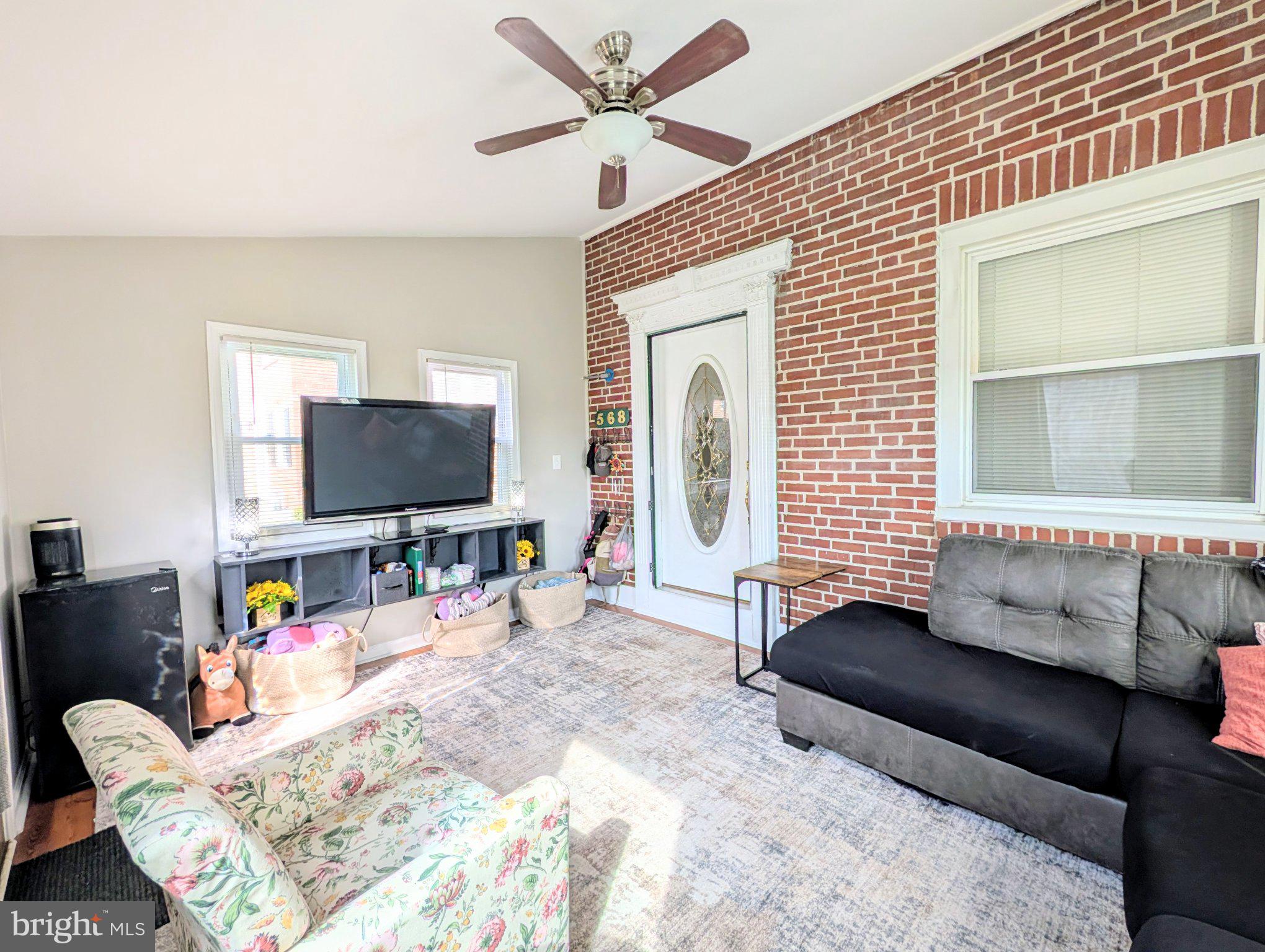 568 Michell Street Ridley Park, PA 19078 - Photo 6 of 41 Charming space with rustic brick accents.