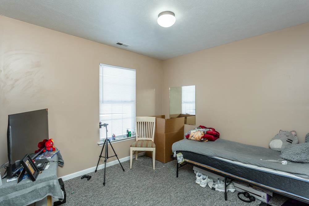 555 Pointe Drive Harrisonburg, VA 22801 - Photo 16 of 24 a room with furniture and window