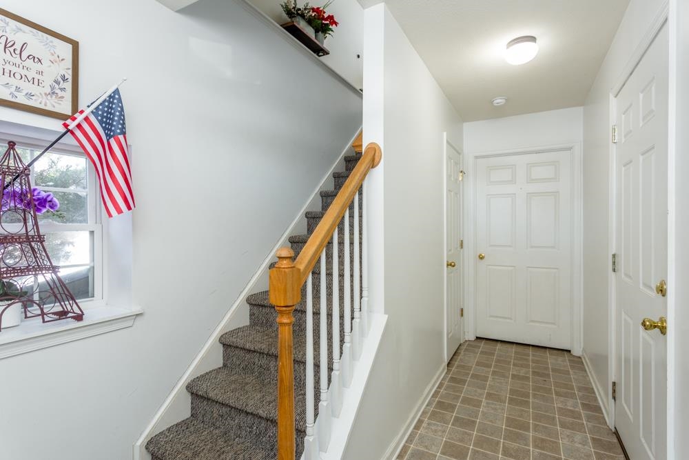 555 Pointe Drive Harrisonburg, VA 22801 - Photo 19 of 24 a view of a hallway with entryway and wooden floor