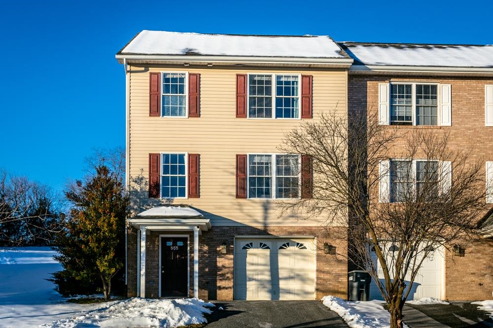 555 Pointe Drive Harrisonburg, VA 22801 - Photo 22 of 24 a front view of a building with a tree