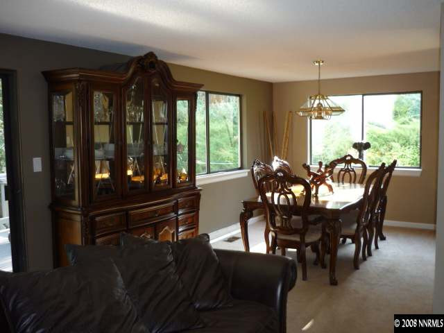 3180 Corey Drive Reno, NV 89509 - Photo 5 of 9 a view of a dining room with furniture window and outside view
