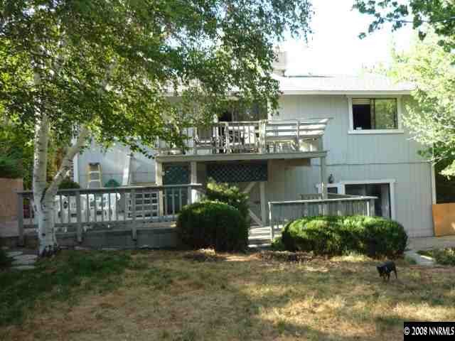 3180 Corey Drive Reno, NV 89509 - Photo 9 of 9 a view of a house with a yard and a garden