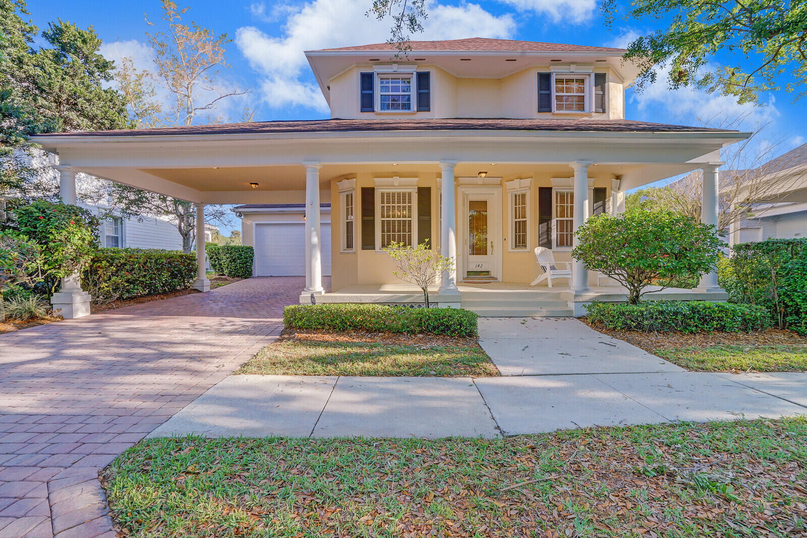 142 Barbados Drive Jupiter, FL 33458 - Photo 1 of 53 front view of house with a yard