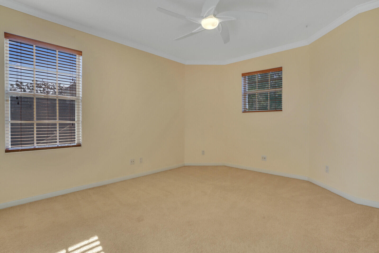 142 Barbados Drive Jupiter, FL 33458 - Photo 27 of 53 a view of an empty room with a window