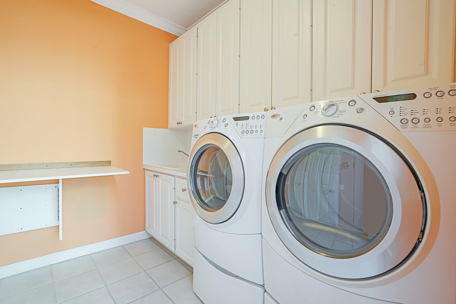 142 Barbados Drive Jupiter, FL 33458 - Photo 30 of 53 a utility room with dryer and washer