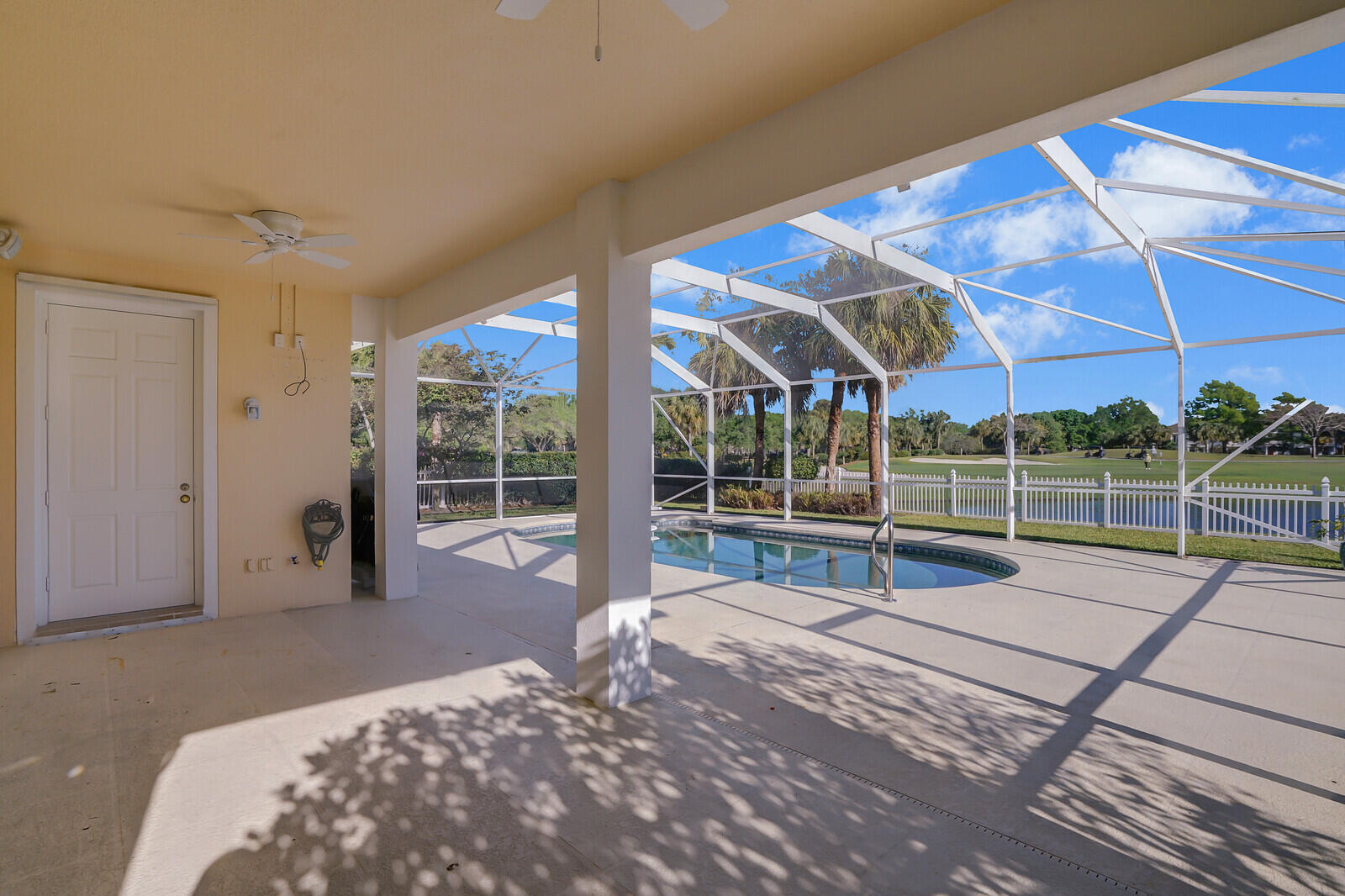 142 Barbados Drive Jupiter, FL 33458 - Photo 32 of 53 a view of a house with a backyard