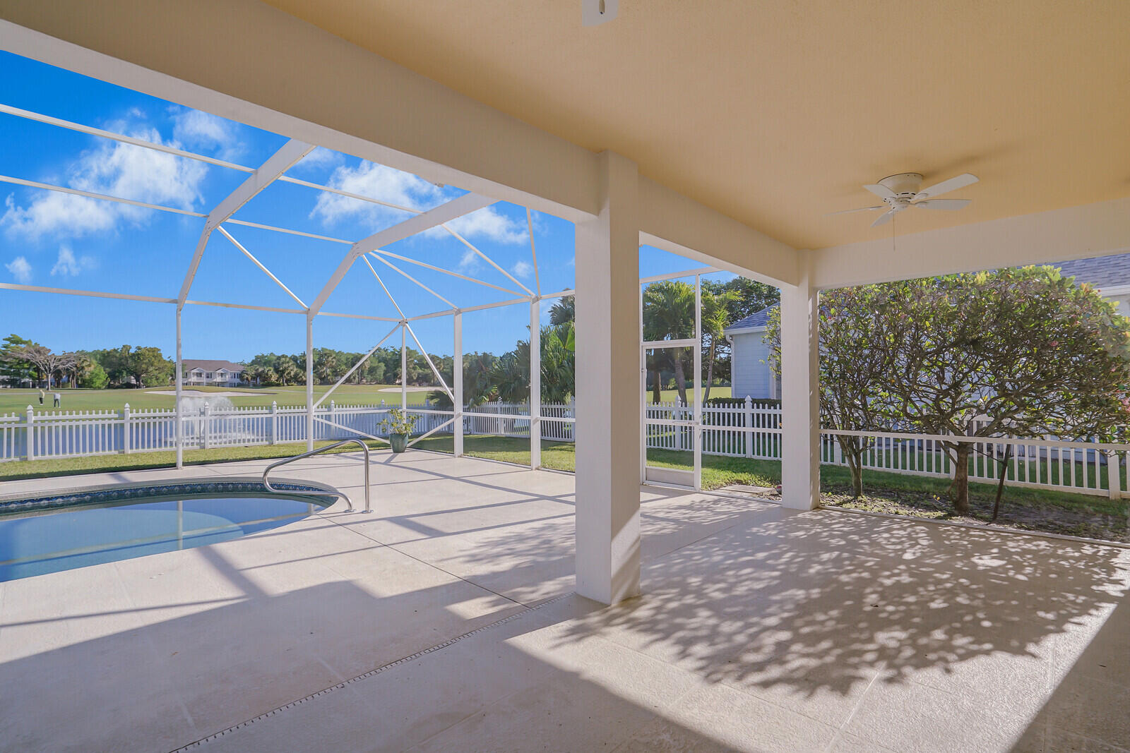 142 Barbados Drive Jupiter, FL 33458 - Photo 33 of 53 a view of a house with a backyard porch and sitting area